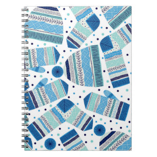 Seamless pattern. Knitted mittens, caps and wool s Notebook