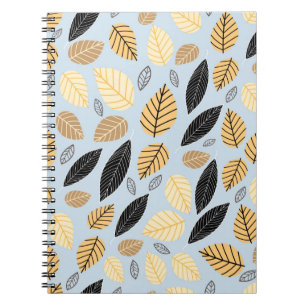 Seamless pattern of autumn leaves on a blue backgr notebook