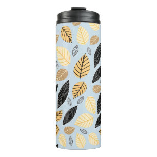 Seamless pattern of autumn leaves on a blue backgr thermal tumbler