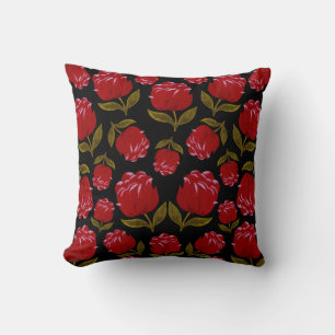 Seamless pattern of red roses on black background throw pillow