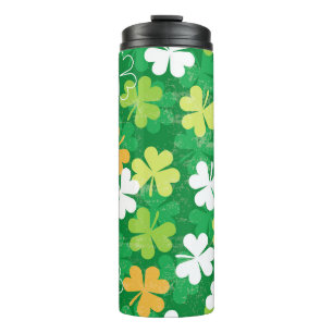 Seamless pattern of scattered clovers and shamrock thermal tumbler