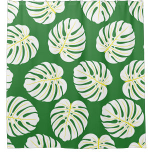 Seamless pattern of white monstera leaves on a dar