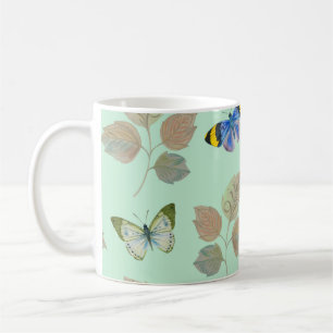 Seamless pattern with bright butterflies and branc coffee mug