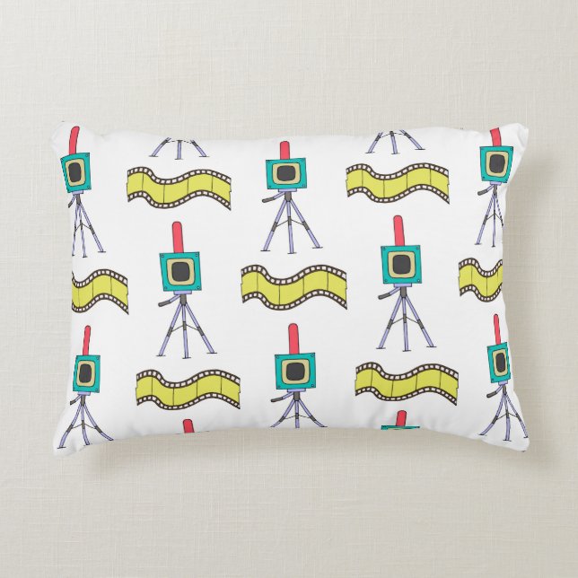 Seamless pattern with cameras and film strips on a accent pillow (Front)