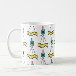 Seamless pattern with cameras and film strips on a coffee mug