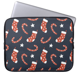 Seamless pattern with christmas socks,candy canes  laptop sleeve