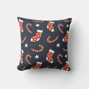 Seamless pattern with christmas socks,candy canes throw pillow