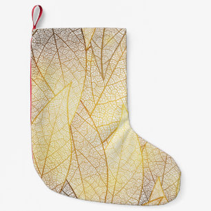 Seamless pattern with gold leaves small christmas stocking
