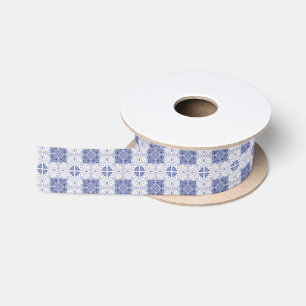 Seamless pattern with intricate blue and white satin ribbon