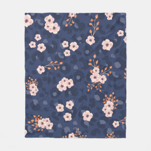 Seamless pattern with leopard skin and pink small fleece blanket