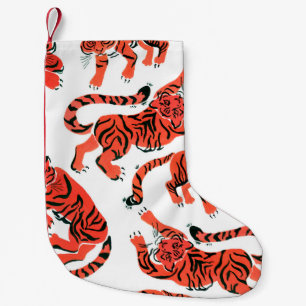 Seamless pattern with painted in gouache tigers in small christmas stocking