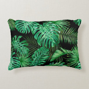 Seamless pattern with tropical leaves on a dark ba accent pillow