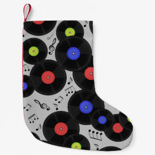 Seamless pattern with vinyl records and notes. small christmas stocking
