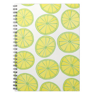 Seamless pattern with yellow lemon slices on white notebook
