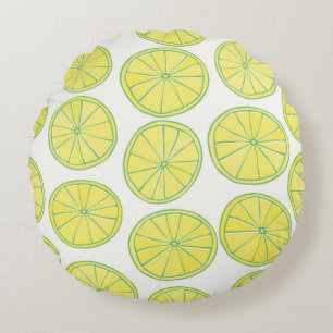 Seamless pattern with yellow lemon slices on white round pillow
