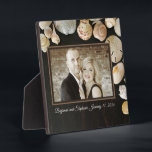 Seashell Frame Newlywed Photo Display Plaque<br><div class="desc">Newlywed photo gift idea. This standing photo frame with seashells and dark wood background (not real wood or shells, photo only) can be personalized with a photo of the couple and one line of text. Horizontal 8 by 10 size, the photo is printed onto the plaque and made to look...</div>