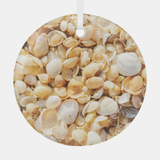 Seashell textured summer beach background. glass ornament