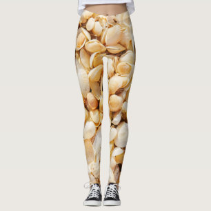 Seashell textured summer beach background. leggings