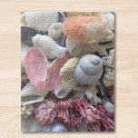 Seashells And Coral Jigsaw Puzzle<br><div class="desc">This pretty puzzle is decorated with a collection of pink,  white and mauve 
seashells and coral gatered on the beaches of the Seychelles Islands.
You can customize this puzzle by replacing the photo with one of your own shell collection or any photo you prefer.</div>