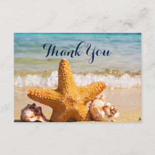 Seashells et Starfish sur le Beach Merci