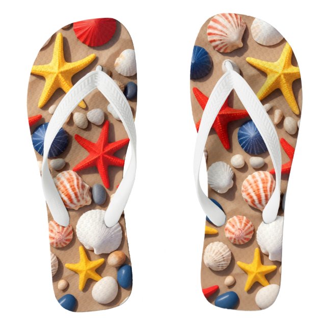  Seashells, starfish, and pebbles on a sandy beach Flip Flops (Footbed)