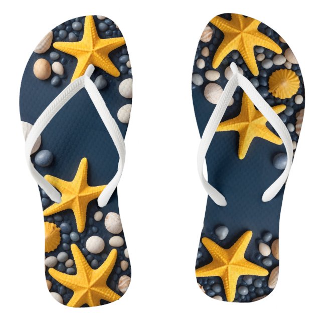  Seashells, starfish, and pebbles on a sandy beach Flip Flops (Footbed)