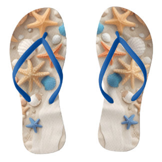 Seashells, starfish, and pebbles on a sandy beach  flip flops