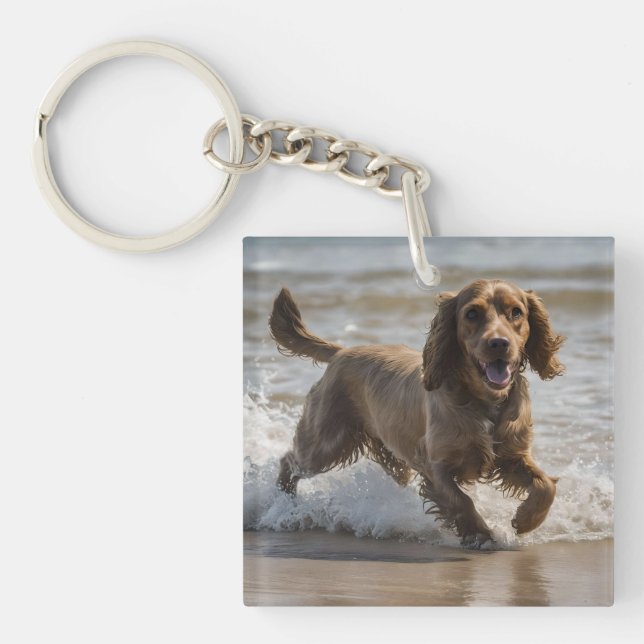 "Seaside Fun: Cocker Spaniel at Play in the Ocean Keychain (Front)