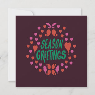 Season greetings in green handwriting with hearts holiday card