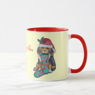seasonal cute black and brown puppy christmas mug
