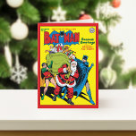 Season's Greetings From Batman And Robin Holiday Card<br><div class="desc">Send warm holiday wishes with Gotham’s finest! This cheerful holiday card features Batman and Robin helping Santa Claus carry his giant sack of toys to all the good little children of the world. Perfect for DC Comics fans, this heartwarming design combines the magic of the season with the heroic spirit...</div>
