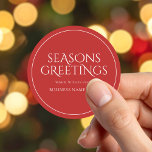 Seasons Greetings Red Modern Elegant Business Classic Round Sticker<br><div class="desc">Custom business Christmas stickers featuring Seasons Greetings in elegant modern typography. Add your own personalized Christmas greeting or short thank you message to corporate clients and customers.</div>