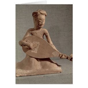 Seated musician playing a lute, from