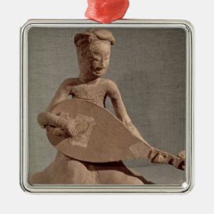 Seated musician playing a lute, from metal ornament