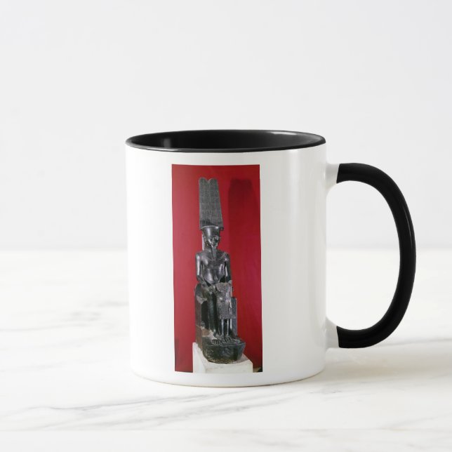 Seated statue of god Amon protecting Mug (Right)