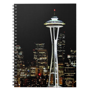 Seattle skyline at night, with Space Needle. Notebook