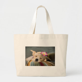 Secourir le sac fourre-tout de chiot couché