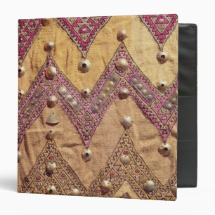 Section of embroidered fabric with gold plaques binder