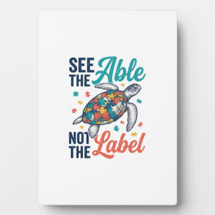 See the Able Turtle Puzzle Awareness Shirt Design_ Plaque