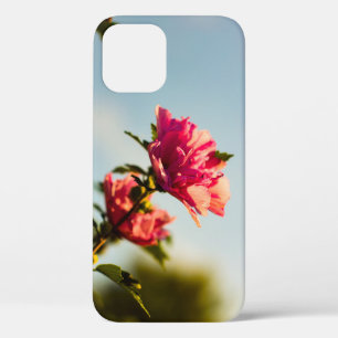 Selective focus photo of pink hibiscus flower iPhone 12 case