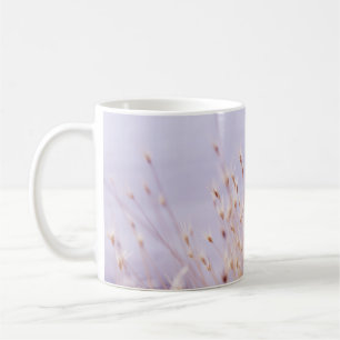 SELECTIVE FOCUS PHOTOGRAPHY OF GRASS FIELD COFFEE MUG