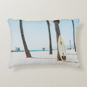Selective focus photography of white surfboard accent pillow