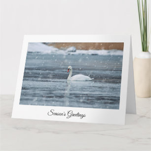 Seoson's Greetings card with white swan in snow