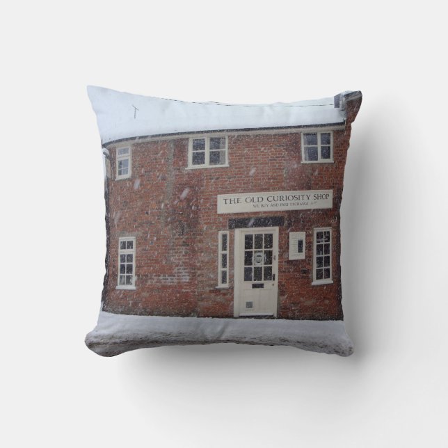 sepia photo of the old curiosity shop in snow throw pillow (Front)