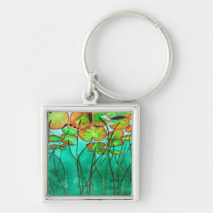 serene green pond with lilypads keychain