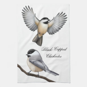 Serviette de cuisine couverte par noir d'oiseaux