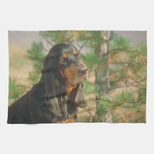 Serviette de cuisine noire et bronzage de chien de