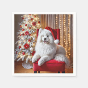 Serviette En Papier Père Noël Samoyed Dog sur une chaise rouge