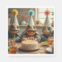 Turtles celebrating birthday with cake and hats 