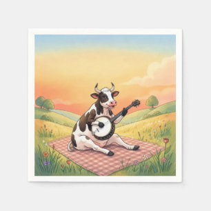 Serviette En Papier Vache jouant du banjo sur une couverture